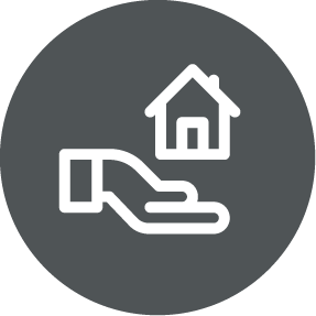 Icon of a hand holding a house, set in a dark gray circle.